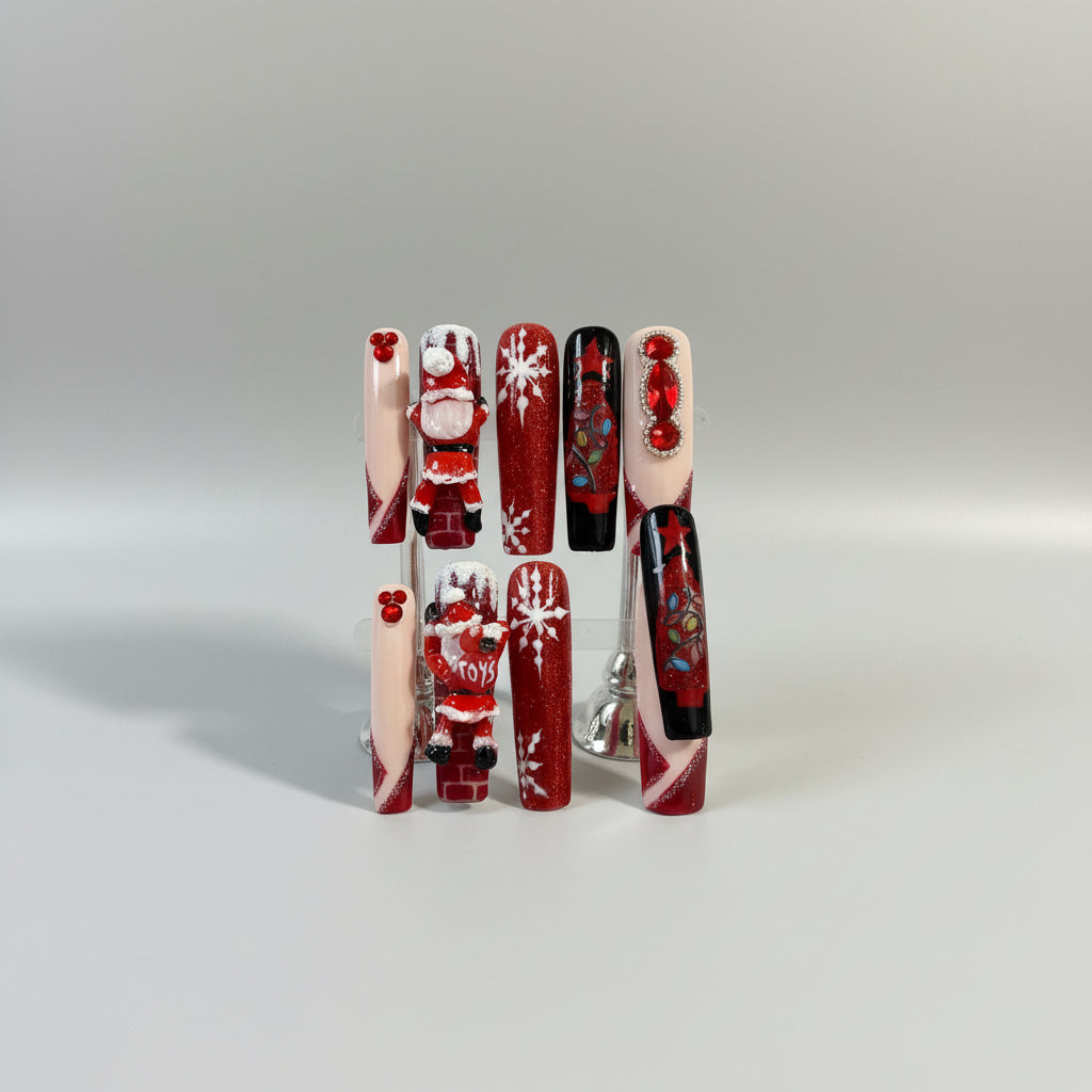 A set of 10 Christmas-themed press-on nails displayed on a white card labeled 'El Copi Nails' and 'S-191'. The nails feature festive red glitter, white snowflakes, Santa Claus designs, red stars, and a black-and-white striped nail with red stars.