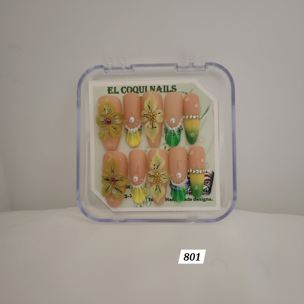 A set of 10 press-on nails in a clear plastic clamshell case, featuring peach-colored almond-shaped nails decorated with yellow flowers, green gradients, and pearl details. The brand 'EL COQUI NAILS' is visible on the insert card.