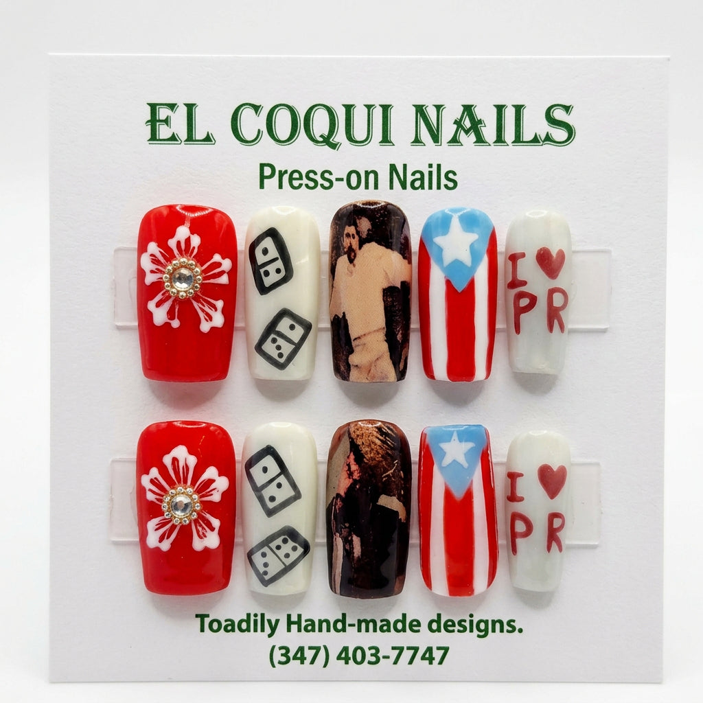 A clear plastic clamshell case containing press-on nails with patriotic designs, including red and white flowers, black and white dice, Puerto Rican flag motifs, and a frog design. The packaging card reads 'EL COQUI NAILS'.