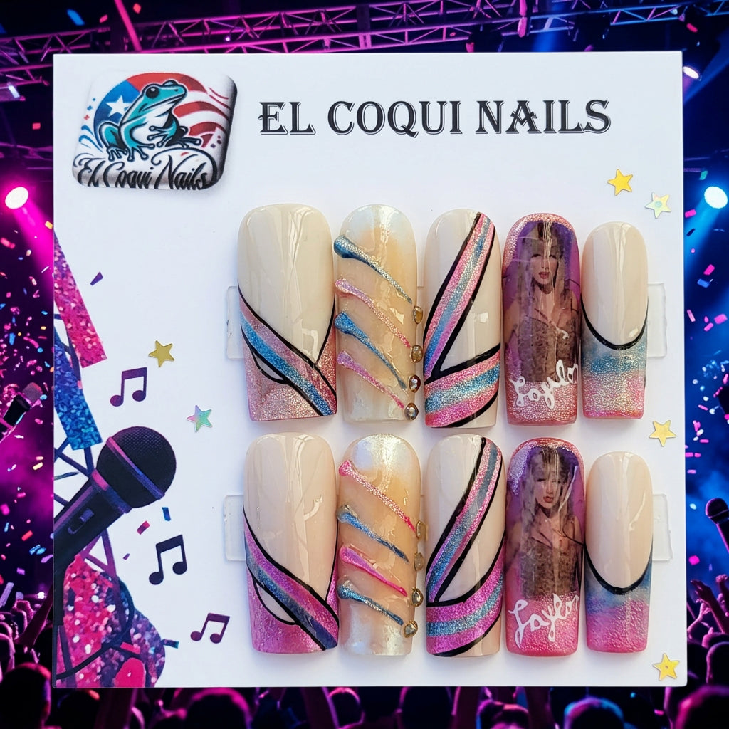 A set of 10 press-on nails displayed on a branded El Coqui Nails card, featuring various designs including diagonal stripes, glitter, and holographic patterns in pink, blue, and gold.
